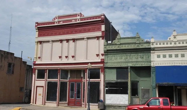SIGNIFICANT PERIOD STARTS IN 1875 AND INCLUDES A CITY HALL, HOTEL, GOVERNMENT OFFICES, AND COMMERCIAL BUILDINGS