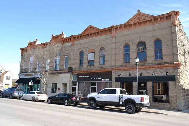 The Cord-Lobban-Smith Building Block, 313-319 N Holden in Warrensburg, Missouri. A contributing building to the Holden and Pine Streets Commercial Historic District