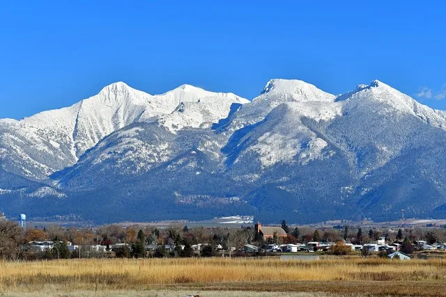 View on the town St. Ignatius in Montana with the brick St. Ignatius Mission; in the background: the Mission Range