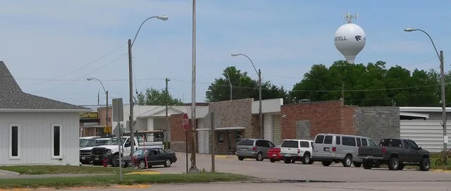 Downtown Axtell, Nebraska : east side of Main Street, looking north from about U.S. Highway 6 / U.S. Highway 34 .