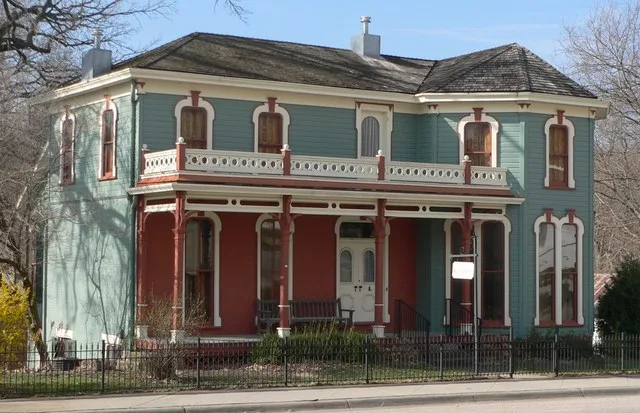 Carson house on south side of Main Street in Brownville, Nebraska ; seen from the northeast. The building was constructed in 1860 as a one-story brick house; additions were made t...