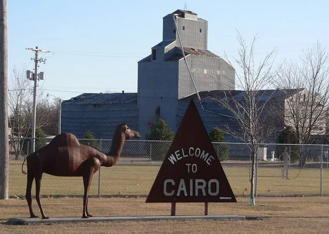 Sign on Nebraska Highway 11 at northern edge of Cairo, Nebraska .