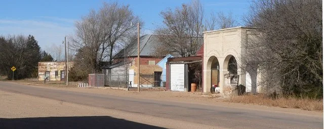 North side of Main Street in Cowles, Nebraska; camera is facing northwest.