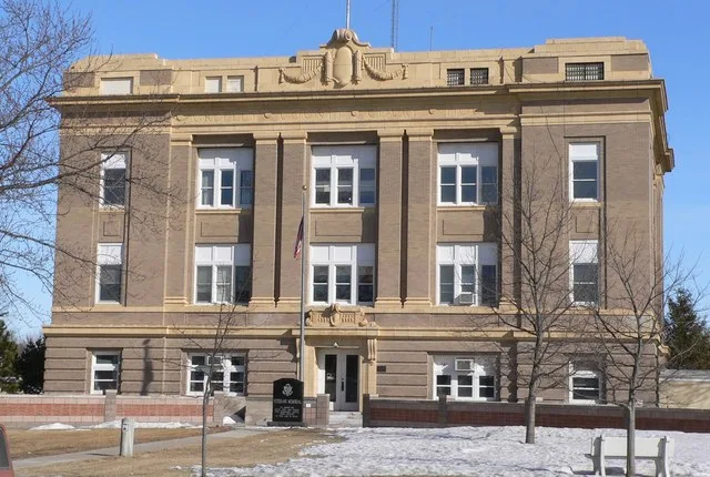 Greeley County Courthouse in Greeley, Nebraska ; seen from the west. The building was designed in Classical Revival style by architects Berlinghof & Davis, and built in 1913. It i...