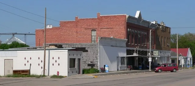 Downtown North Loup, Nebraska : north side of 1st Street ( Nebraska Highway 11 ), seen looking eastward from about B Street.