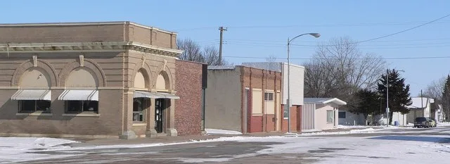 North side of 5th Street in Oakdale, Nebraska . At left is the Oakdale village hall.