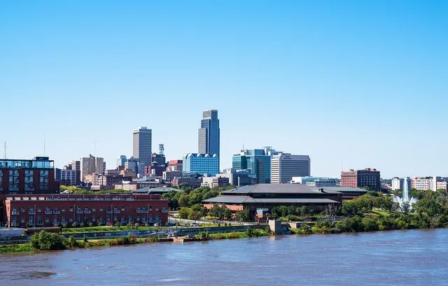 The downtown skyline in Omaha, Nebraska, as seen from across the Missouri River in Council Bluffs, Iowa. /sim