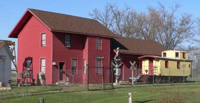 Chicago & North Western Railway depot, now located in Gilman Park, Pierce, Nebraska . The depot was built in Pierce in 1880 for the Fremont, Elkhorn and Missouri Valley Railroad ...