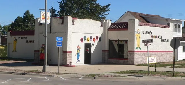 Plainview Klown Doll Museum, located at southeast corner of Park Avenue (U.S. Highway 20) and Maple Street in Plainview, Nebraska.
