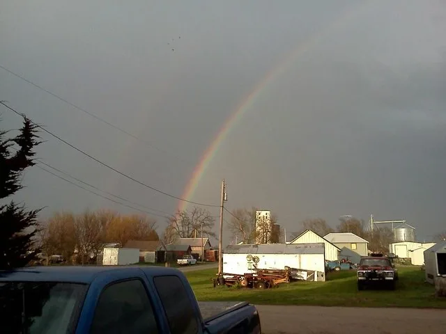 Photo of double rainbow and Richland skyline