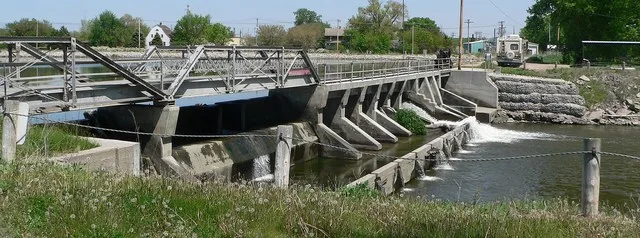 Diversion dam on the Cedar River in Spalding, Nebraska ; seen from the west. The dam directs a portion of the river's flow into a canal that leads to a hydroelectric generator; a...