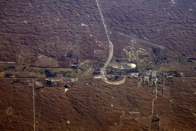 Thedford, Nebraska , in the midst of Nebraska's vast sand hills country. Nearest town to the Nebraska National Forest (far upper left corner), an anomalous patch of dark evergreen...