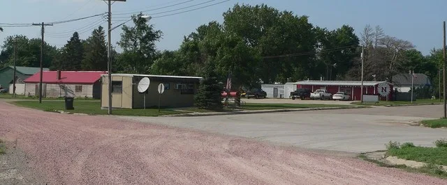 Downtown Waterbury, Nebraska. Camera is facing generally northwest from the triple junction of Garrett, 2nd, and Logan Streets.