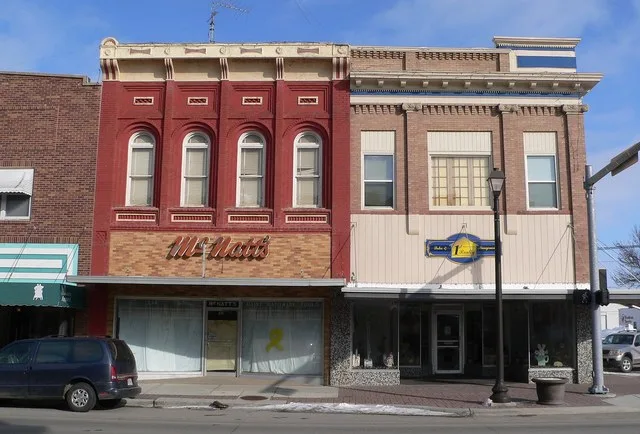 Buildings on east side of 200 block of North Main Street in Wayne, Nebraska . The block is part of the Wayne Commercial Historic District , which is listed in the National Registe...