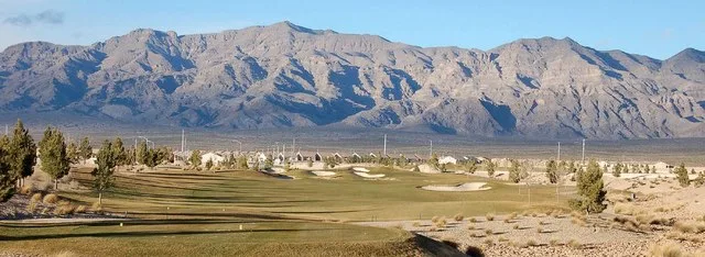 The southern section of the Las Vegas Range , and the Aliante Golf Club in the Las Vegas Valley — in Clark County , southern Nevada. The highest point of the range is Gass Peak at...