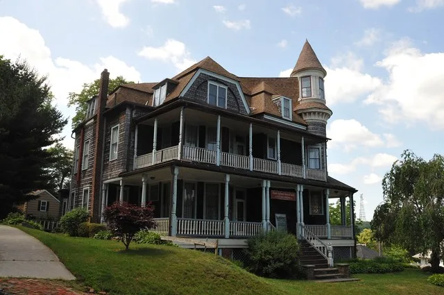– AKA STRAUSS MANSION IN ATLANTIC HIGHLANDS;1893; USED AS A SUMMER COTTAGE BY ADOLPH STRAUSS, A NEW YORK IMPORTER AND MERCHANT. THE HOUSE IS ON A HIGH HILL THAT OVERLOOKS SANDY HO...