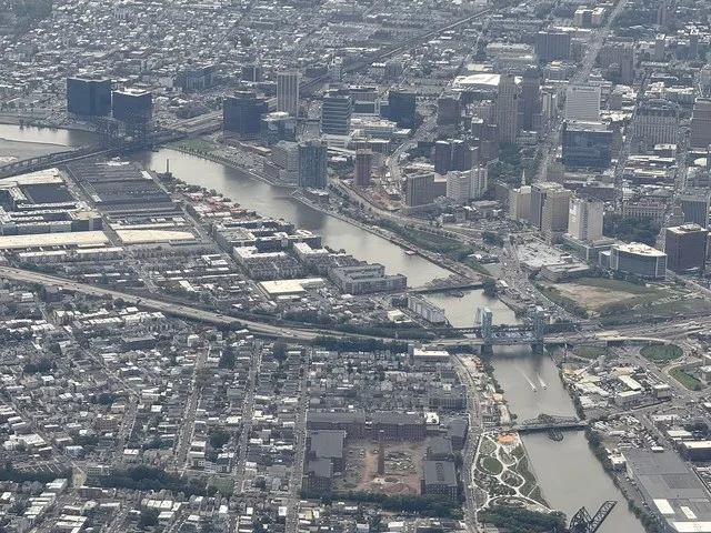 Aerial view centered on the Passaic River at the border of Harrison and East Newark in Hudson County, New Jersey and Newark in Essex County, New Jersey, seen from an aircraft whic...