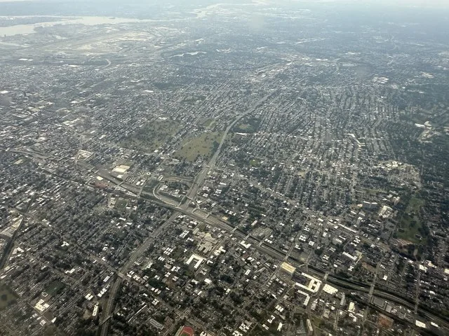 Aerial view centered on East Orange in Essex County, New Jersey, seen from an aircraft which just departed from Newark Liberty International Airport