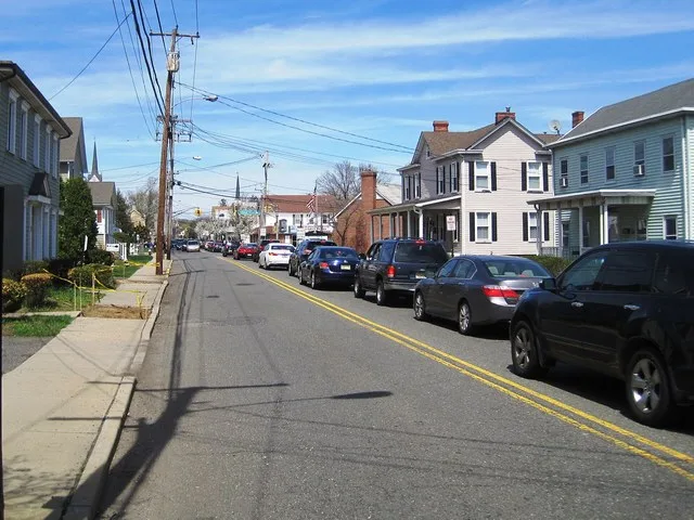 Photo of Englishtown , New Jersey , a borough in Monmouth County . Photo taken looking north along Main Street ( County Route 527 ) towards Tennant Avenue ( CR 522 ).