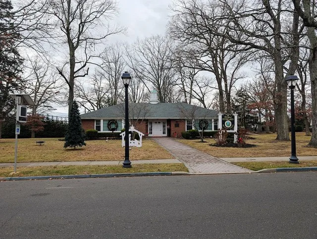 Photo of the Interlaken , New Jersey municipal offices building. Photo taken from County Route 15 (Grassmere Avenue) looking south-southwest.