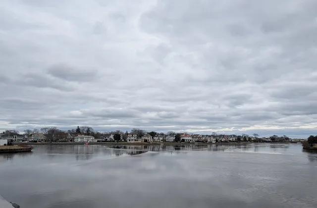 View of the western part of Loch Arbour , New Jersey looking across Deal Lake from the Main Street Causeway ( County Route 15 ) on the border of Interlaken and Asbury Park . Photo...