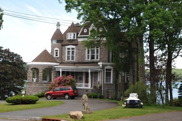 CASTLE ON THE LAKE – EDGEMERE AVENUE; CIRCA 1895 DESIGNED & BUILT FOR FRANCIS HIMPLER, NOTED ARCHITECT OF THE 19TH CENTURY. CONSTRUCTED OF IMPORTED STONE W/MANY ARCHITECTURAL FEAT...