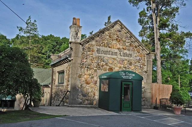 RAILROAD STATION IS A KEY STRUCTURE IN THE DISTRICT; WAS BUILT IN 1912 ON PROPERTY ONCE OWNED BY HERO BULL, A FORMER SLAVE. THE STATION S CORNERSTONE WAS LAID BY SUFFRAGIST BELLE...