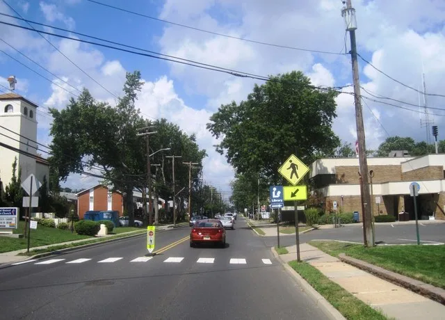 Photo showing the center of Neptune City , New Jersey . Photo taken along westbound Sylvania Avenue ( County Route 17 ) at Lipman Avenue.