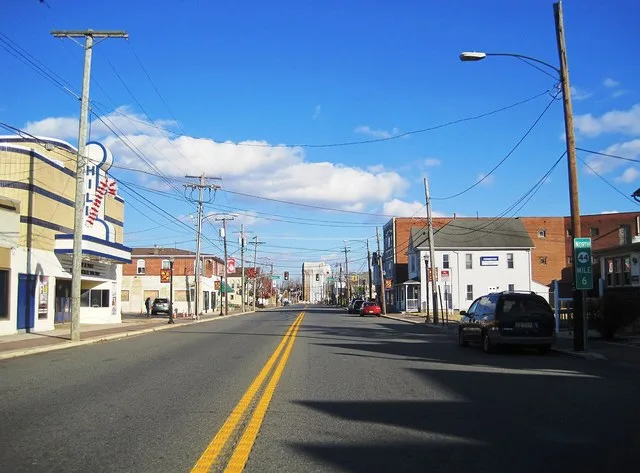 Photo of northbound New Jersey Route 44 (Broad Street) in Paulsboro , New Jersey . Photo taken looking east-northeast between Spruce Street and Delaware Street.