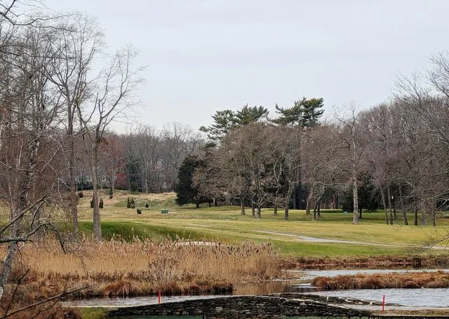 Photo of the Spring Lake Golf Club in Spring Lake Heights , New Jersey . Photo taken from the west side of a culvert carrying North Branch Wreck Pond Brook under New Jersey Route...