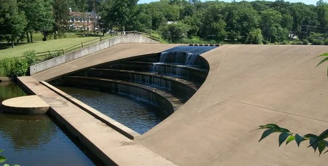 Watchung Lake is to the right. This dam has cascading levels.