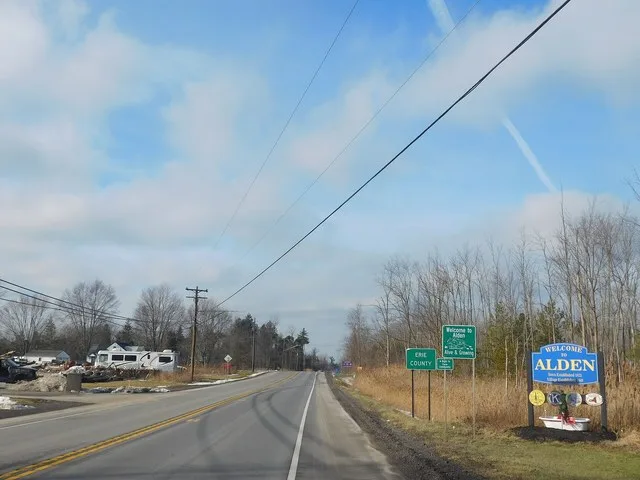 Signage entering the town of Alden, New York .