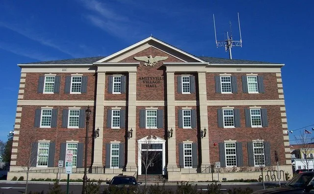 The new Amityville Village Hall, Amityville, New York, built in 2008, at least according to the cornerstone visible to the right of the door. Leadership in Energy and Environmenta...