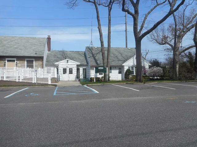 Third shot of the Brightwaters Village Hall and Court Room as seen from Seneca Drive and Peters Boulevard in the Village of Brightwaters, New York. Though it might seem similar to...