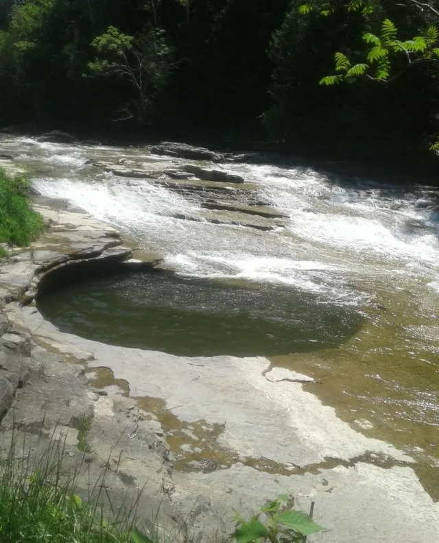 "The pot that washes itself" on the Canajoharie Creek in Canajoharie. Taken on May 27, 2019.