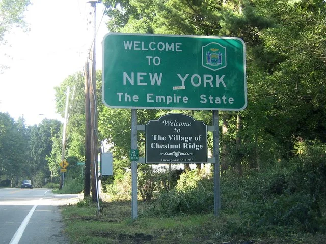 NY 45 begins here at the New York – New Jersey state line in Chestnut Ridge.