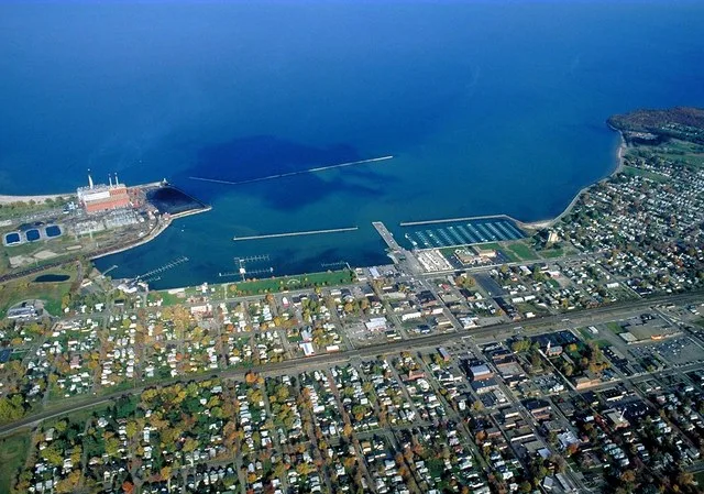 Aerial view of Dunkirk, New York, USA. View is to the north over Lake Erie. The large Niagara Mohak power plant can be seen at left.