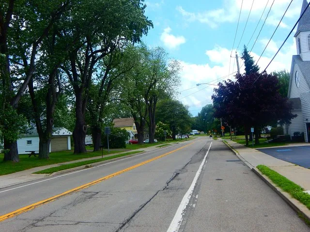 Route 249 heading through the village of Farnham, New York .