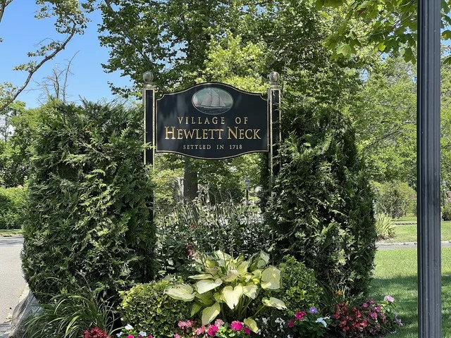 A Hewlett Neck welcome sign an an entrance to the Inc. Village of Hewlett Neck, NY on August 8, 2022.