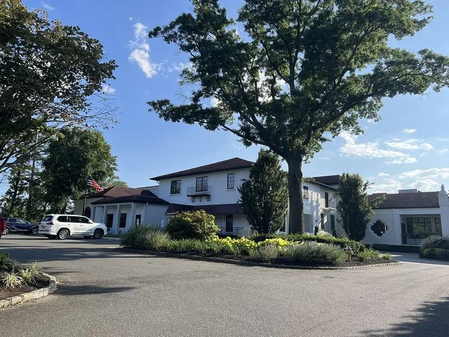 Lake Success Village Hall & Clubhouse at the Lake Success Golf Club in Lake Success, NY on August 23, 2024. This building houses the golf club's clubhouse, in addition to the Lake...