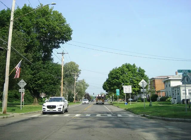 Photo of eastbound New York State Route 370 (Second Street) at Sycamore Street in the village of Liverpool , New York . Photo taken looking east-southeast.