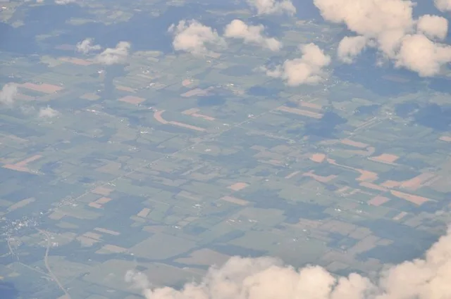 Aerial view from SW of New York State Route 96A from Lodi, New York to Interlaken, New York in Seneca County, New York. Shot from roughly over Seneca Lake (which is not visible he...