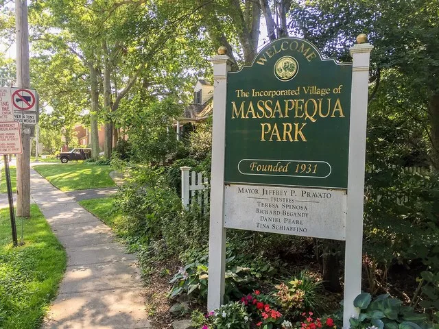 Sign says: Welcome to Massapequa Park, New York.