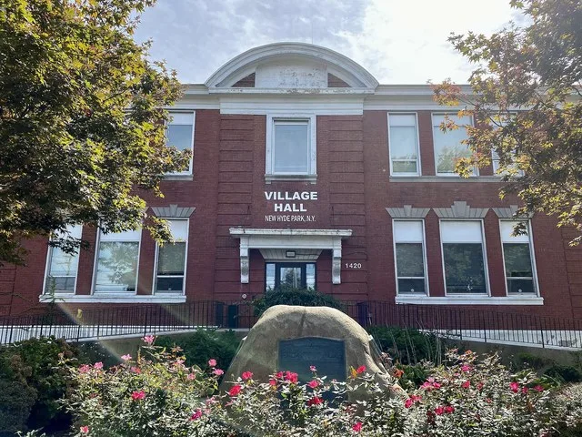 New Hyde Park Village Hall in New Hyde Park, Long Island, New York on October 2, 2021, as seen from the garden in front of the main entrance.