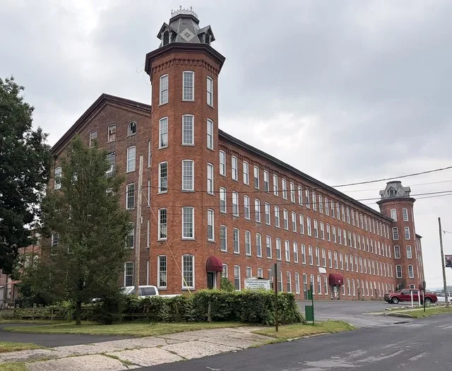 Mill #3, a former textile mill now repurposed as office and retail space in New York Mills, New York