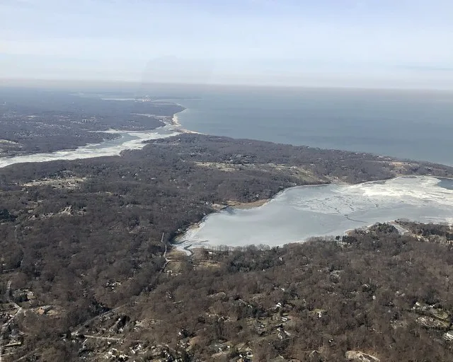 The Inc. Village of Nissequogue, NY and its surrounding areas, as seen on February 2, 2019, looking northwest from roughly over the nearby hamlet of St. James. Part of the Inc. Vi...