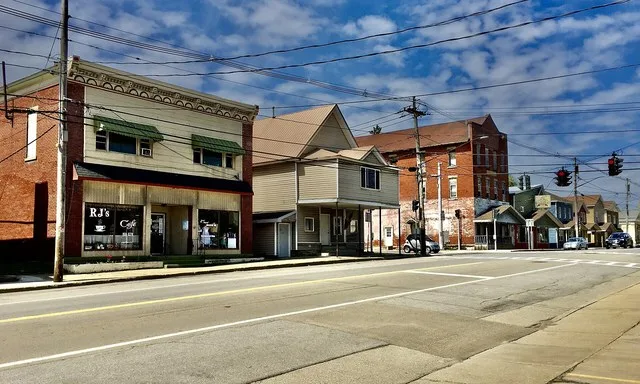 Looking northward along Gowanda State Road (U.S. 62) in the village center of North Collins, New York, on a sunny afternoon in April 2021.