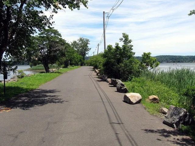 Looking west along the eastern end of the former railroad pier of en:Piermont, New York on a sunny midday