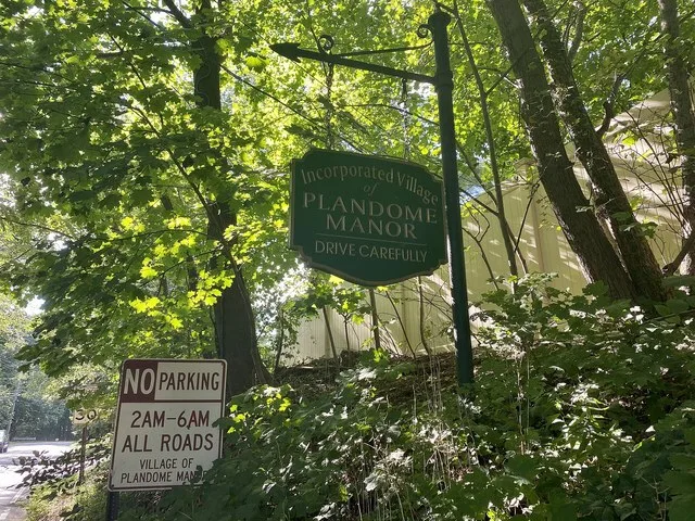 A welcome sign at the entrance to Plandome Manor, Long Island, New York at the Flower Hill–Plandome Manor Border on Stonytown Road. This photo was taken on September 2, 2021.
