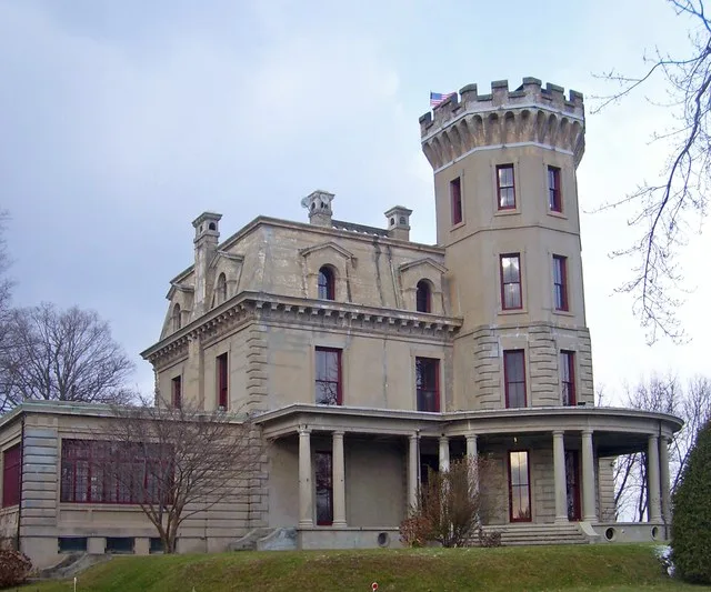 William E. Ward House , believed to be the first building in the United States built entirely of reinforced concrete , on the state line between Rye Brook , NY (the left window of...